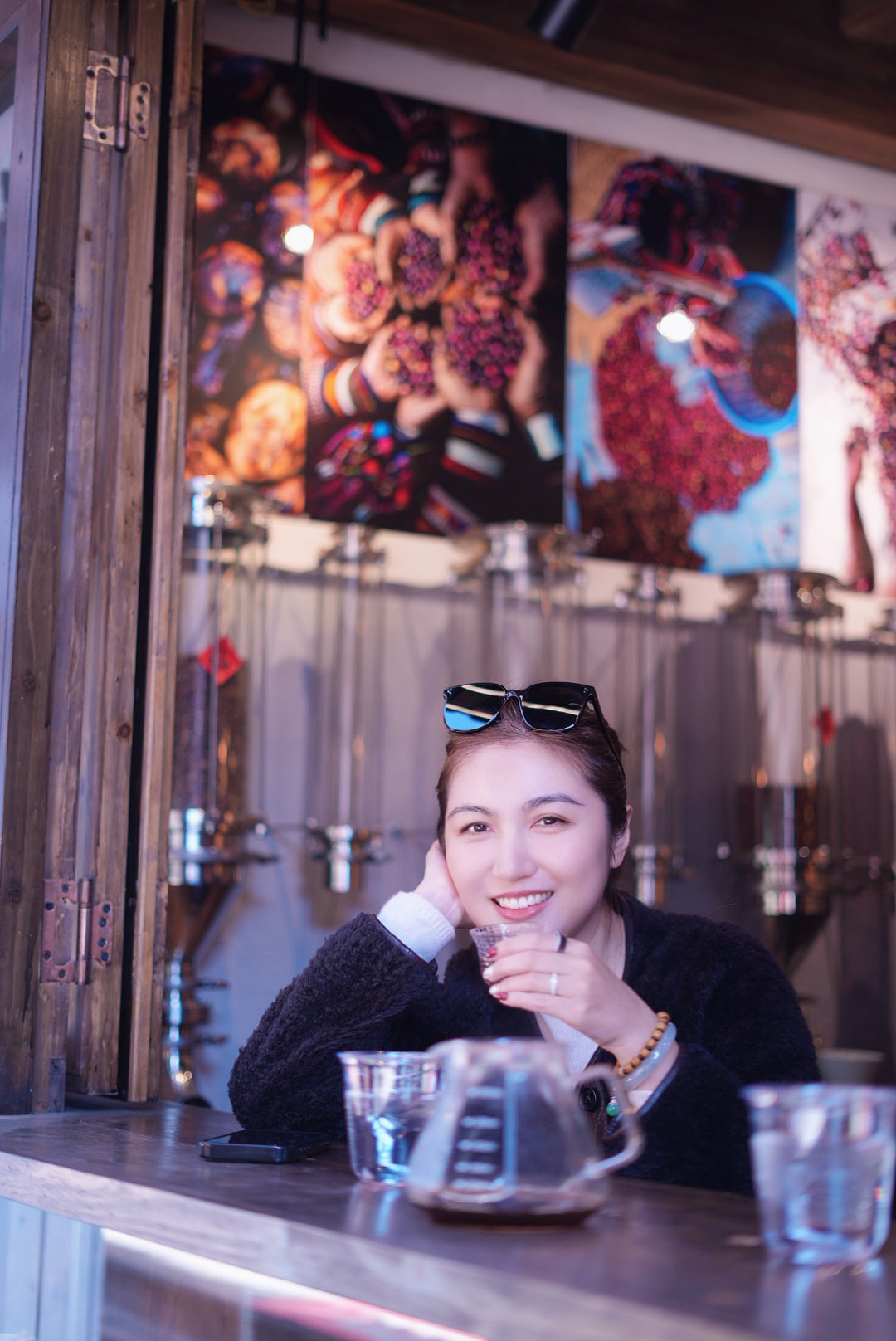 Michelle Yin enjoying a local drink while travelling in China
